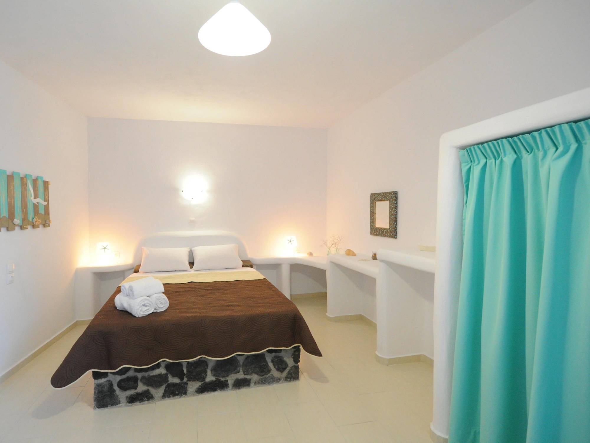 มานิอาส ฟิรา เรสซิเดนซ์เสส Aparthotel ภายนอก รูปภาพ
